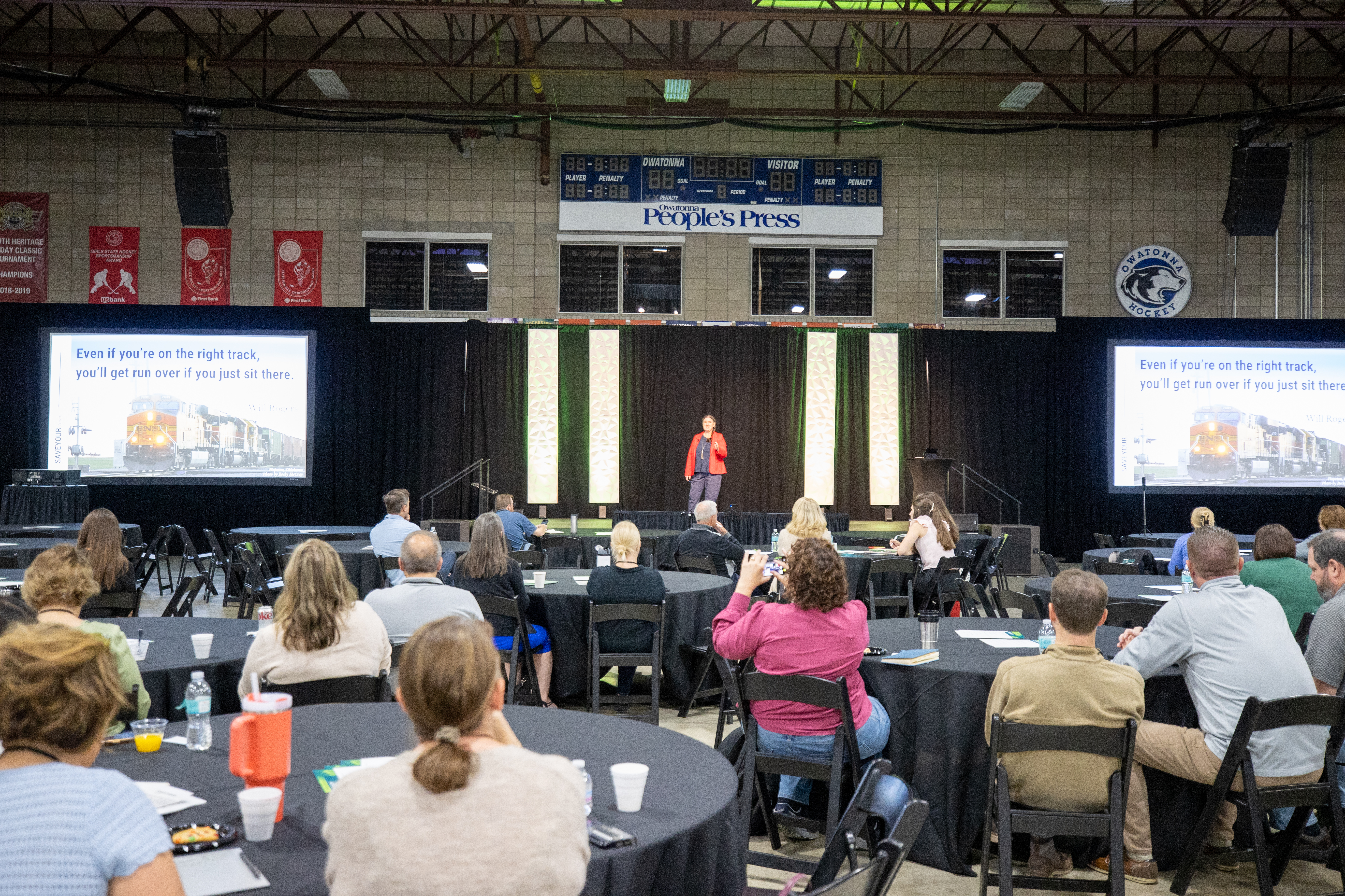 Speaker presenting to attendees at the Rooted & Rising Rural Forum